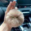 Nuevo colgante de peluche con cabeza de gato llavero femenino lindo animal llavero colgante de muñeca pequeño regalo al por mayor