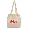 2026 Nuevo Bolso de Hombro de Lona con Estampado de Letras de Gran Capacidad Transfronterizo Versátil de Mano Bolsa de Compras Ecológica Unisex para Viaje