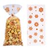 Bolsa plana de celofán para dulces transfronteriza con impresión a color de copo de nieve, bolsa de embalaje para snacks, bolsillo para regalo de turrón navideño con lazo