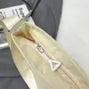 Bolsa de tela fresca estilo coreano para mujer 2026 Nueva versátil para el trabajo, viajes, bolso de hombro para teléfono móvil, bolso cruzado tipo cubo