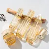 Materiales de Empaque para Botellas de Vidrio Cosmético Botella de Vidrio para Crema de 30g 40ml 100ml Botella con Dispensador Botella de Vidrio Dorada Botella para Loción