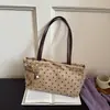 Bolso de mano de lunares estilo coreano para mujer, nueva colección 2026, bolso tote simple y elegante para el trabajo, bolso de hombro moderno y estéticamente agradable