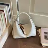 Bolsa transversal retrô com design de nicho texturizado feminina verão 2026 nova moda bolsa de mão simples cor sólida pequena bolsa tote