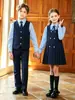 Nueva colección de otoño de conjuntos de uniforme escolar para estudiantes de primaria, con un diseño de estilo británico, adecuados para actuaciones de coro infantil y como uniformes de jardín de infantes, incluyendo vestidos y conjuntos