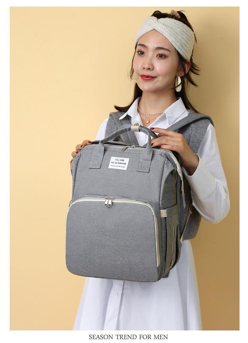 新款便携式折叠婴儿床14.jpg