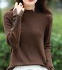 Camisa de cuello alto medio de otoño e invierno 2024, nuevo temperamento intelectual de viajero diario, suéter de punto interior de moda para mujer