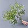 Plantas verdes artificiales en stock, manojos de helecho, hojas de helecho, hierba de helecho para decoración de paredes interiores y diseño de paisajes, césped artificial al por mayor