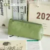 Bolsa de cosméticos material PU impermeable esencial para viajes de negocios artefacto de almacenamiento bolso de mano de viaje para mujer liquidación pequeño y portátil