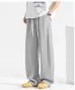 Tamanho grande 8XL 150kg calça de moletom cinza calça casual masculina primavera e outono 2026 calça reta com efeito de caimento nova calça esportiva