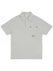 Camisa Polo Casual Nanxia com Botões Decorados no Bolso Manga Curta Masculina de Verão Gola Reversível Simples Ombro Caído Versátil