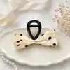 Nuevo y elegante clip de garra de lunares contrastantes en blanco y negro retro, nuevo y exquisito pasador de pinza de tiburón con lazo para mujer