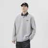 Elegante polo de manga larga con bloques de color para hombre, nuevo top de camiseta casual holgado de moda primavera/otoño 2026