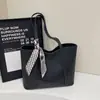 Bolso de hombro casual personalizado de moda, diseño de nicho, bolso nuevo de alta calidad, bolso tote de moda para mujer verano 2026