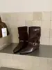Botas de pierna de pantalón de punta que aumentan la altura, botas cortas marrones estilo Maillard, botas para mujer 2026 Otoño/Invierno, botas vaqueras occidentales adelgazantes