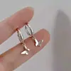 Hebilla de oreja de mariposa con borla moda femenina simple exquisita pendientes coreanos para el trabajo nicho temperamento pendientes de viento frío venta al por mayor