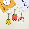 Serie de Dibujos Animados Transfronteriza para Dientes Llavero Colgante de Goma Suave de PVC Colgante para Bolsos Llavero Colgante para Mochila al por Mayor