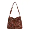 2026 Nuevo Estilo Chica Caliente Gran Capacidad Texturizada Lujo Ligero Bolso de Hombro Cruzado Tote para Mujeres con Diseño Único de Remaches para Viajar al Trabajo