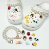 Encantos lindos de dibujos animados para zapatos con varios agujeros, decoraciones versátiles de resina para zapatos, mariposa, burbuja, flor, animales, charms decorativos al por mayor