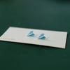 Pendientes de botón de cerámica populares estilo coreano para mujer, combinación fresca y versátil, pendientes pequeños para la semana, joyería, fuente de puesto callejero, nuevos