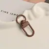 Broche de Puerta Pintado de Colores Llavero de Aleación de Colores Caramelo Accesorio Hecho a Mano DIY Colgante para Bolsa de Muñeca Pin para Perro