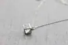 Collar con Colgante de Cubo Minimalista Transfronterizo Colgante de Circonita Colgante de Cubo Hueco Europeo y Americano