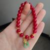 Pulsera de cuentas rojas imitación cinnabar chino para parejas, cuentas de transferencia, hebilla de seguridad de mariposa, pulsera con colgante de mariposa, suministro al por mayor