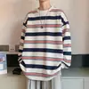 Camiseta holgada de hombre estilo coreano con puños acanalados, top a rayas de manga larga con estampado digital de moda otoño/invierno 2026 para mujer