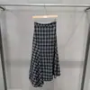 Traje de cuadros retro de otoño e invierno transfronterizo 2026, conjunto de dos piezas de falda midi entallada y camisa elegante con corbata, moda