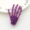Pinza para el pelo de hueso de mano de venta caliente transfronteriza Garra de fantasma de Halloween Garra de calavera Pinza para el pelo fluorescente Mismo estilo de cristal Accesorio para el pelo Harajuku