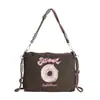 Bolsa Satchel Transversal Fofa Popular Japonesa e Coreana 2025 Ombro Único Passeio Nova Bolsa de Ombro Feminina de Nylon de Grande Capacidade