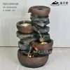 Suministro exclusivo transfronterizo de adornos de fuente de agua giratoria de cerámica, fuente de agua circulante, decoración de lujo ligero para sala de estar y piso de club al por mayor