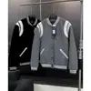 Chaqueta de béisbol de alta gama para pareja de mujer, otoño 2026, chaqueta retro americana de manga larga con bloques de color de piel sintética