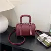 Bolso Boston tejido de lujo ligero transfronterizo de alta calidad Amazon de lujo ligero de un solo hombro nicho comercio exterior versátil para el día a día