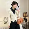 Conjunto de dos piezas de punto patchwork de mezclilla de diseñador, nuevo estilo otoño/invierno 2026, chaqueta entallada adelgazante, suéter versátil