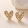 Pendientes de circonitas de oro de 18 quilates chapados en cobre, ligeros y de moda transfronteriza de Aogu. Pendientes femeninos de alta gama que combinan con todo.