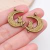 Mezcla de 20 colgantes pequeños de color bronce retro, bonitos colgantes de gato con forma de garra de gato, accesorios de joyería DIY.