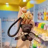 Red de Internet Creativo Sentado Oso de Lana Llavero Moda Linda para Mujer Exquisita Muñeca de Resina Llavero Colgante para Mochila Escolar