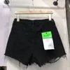 Pantalones Cortos de Mezclilla de Cintura Alta para Primavera y Verano Estudiantes Femeninas Nueva Llegada Rasgados Combinan con Todo Borde Crudo Ajustados Estilo Coreano Pantalones de Pierna Ancha Pantalones Calientes de Moda
