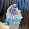 Llavero de Muñeca Gominola Rellena de Aceite Lindo Estudiante Arena Movediza Líquida Colgante para Mochila Máquina de Garra de Pareja Pequeño Regalo al por Mayor