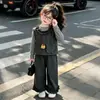 Conjunto de tres piezas de lunares para niña de comercio exterior transfronterizo, nuevo atuendo escolar de otoño 2026, ropa infantil elegante, de una pieza, dropshipping, moderno