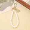 Estilo Tweed Nuevo Colgante de Flor de Perla con Cuentas para Funda de Teléfono Móvil Llavero Colgante Accesorios Cadena Colgante para Equipaje Accesorios para Mujer