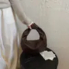 Bolso pequeño para mujer para el trabajo, nuevo modelo de verano 2026, bolso de diseño nicho, bolso tipo empanada de mano, artículo de regalo