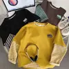 [Niños modernos de estilo coreano] Sudadera a rayas color block versátil y sencilla para primavera y otoño, unisex, corte holgado, cuello redondo, mangas largas