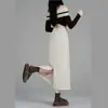 Saia Midi Evasê Elegante Simples Versátil com Fenda Lateral para Afinar a Silhueta Feminina Primavera/Outono 2026