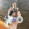 Llavero de Fitness Deportes Llavero Exquisito Colgante para Bolso Colgante para Mochila de Hombres y Mujeres Estilo Ins Colgante de Mancuerna de Fitness