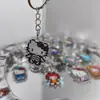 Sanrio Hello Kitty Colgante de Acrílico Pixelado Llavero de Dibujos Animados Lindo Decoración para Mochila de Estudiante Pequeño Regalo