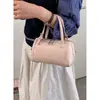 Bolso de Mano con Textura Retro Bolso Tote Pequeño para Mujer 2026 Primavera Nuevo Estilo Bolso Simple Tipo Almohada Bolso Cruzado con Cadena para Hombro