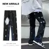Estilo vibe europeo y americano jeans negros de pierna recta holgados para hombre marca de moda ins hip hop costuras rudo guapo calle alta pantalones largos