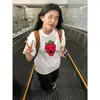 Camiseta de verano de algodón puro con estampado estilo americano de manga corta para hombres y mujeres, nuevo top holgado para parejas, ropa de nicho