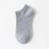 Calcetines desechables para hombre, calcetines de algodón de color liso, uso diario, absorbentes de sudor, resistentes al olor, calcetines finos de verano hasta la pantorrilla, esenciales para viajar, al por mayor